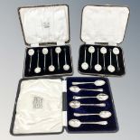 A boxed set of six silver teaspoons and two boxed sets of six silver coffee spoons