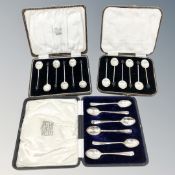 A boxed set of six silver teaspoons and two boxed sets of six silver coffee spoons