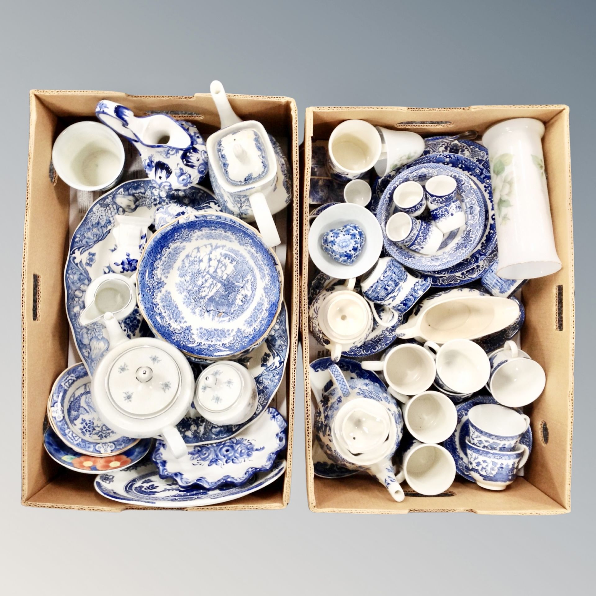 Two boxes of blue and white ceramics : tea ware, Delft jug,