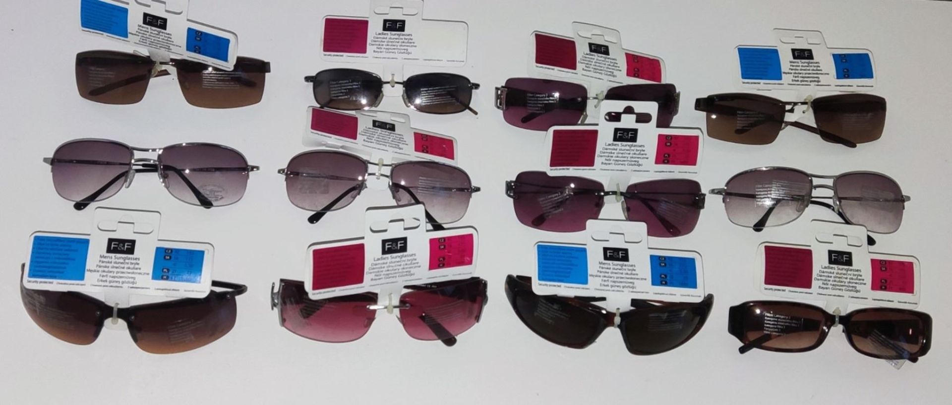 A collection of new F&F Fashion lady's and gent's sunglasses with tags