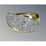 A 9ct gold ring set with approximately 55 diamonds (12.5g), size U.