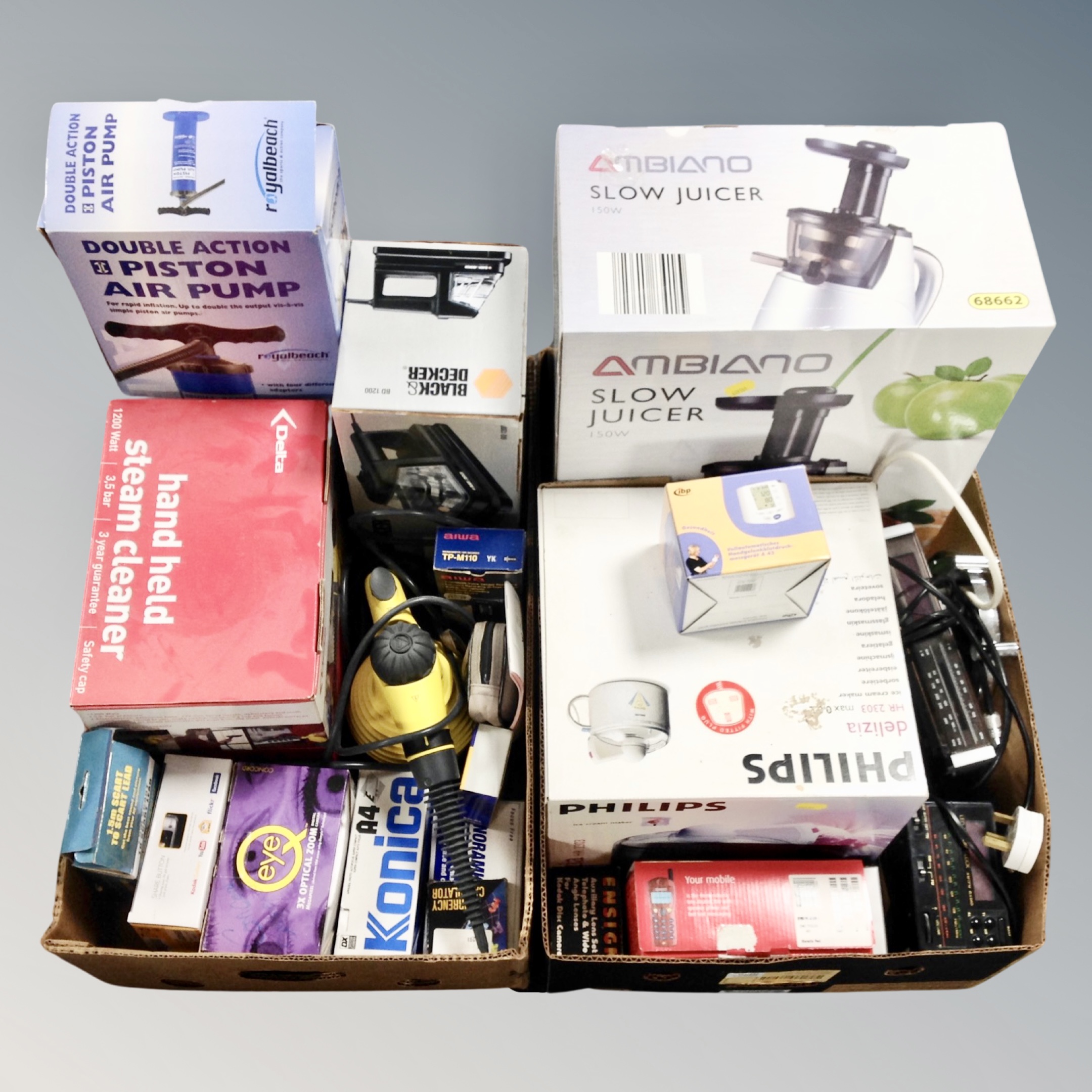 Two boxes of electricals, steam cleaners, air pumps, juicer, clock radios, cameras,