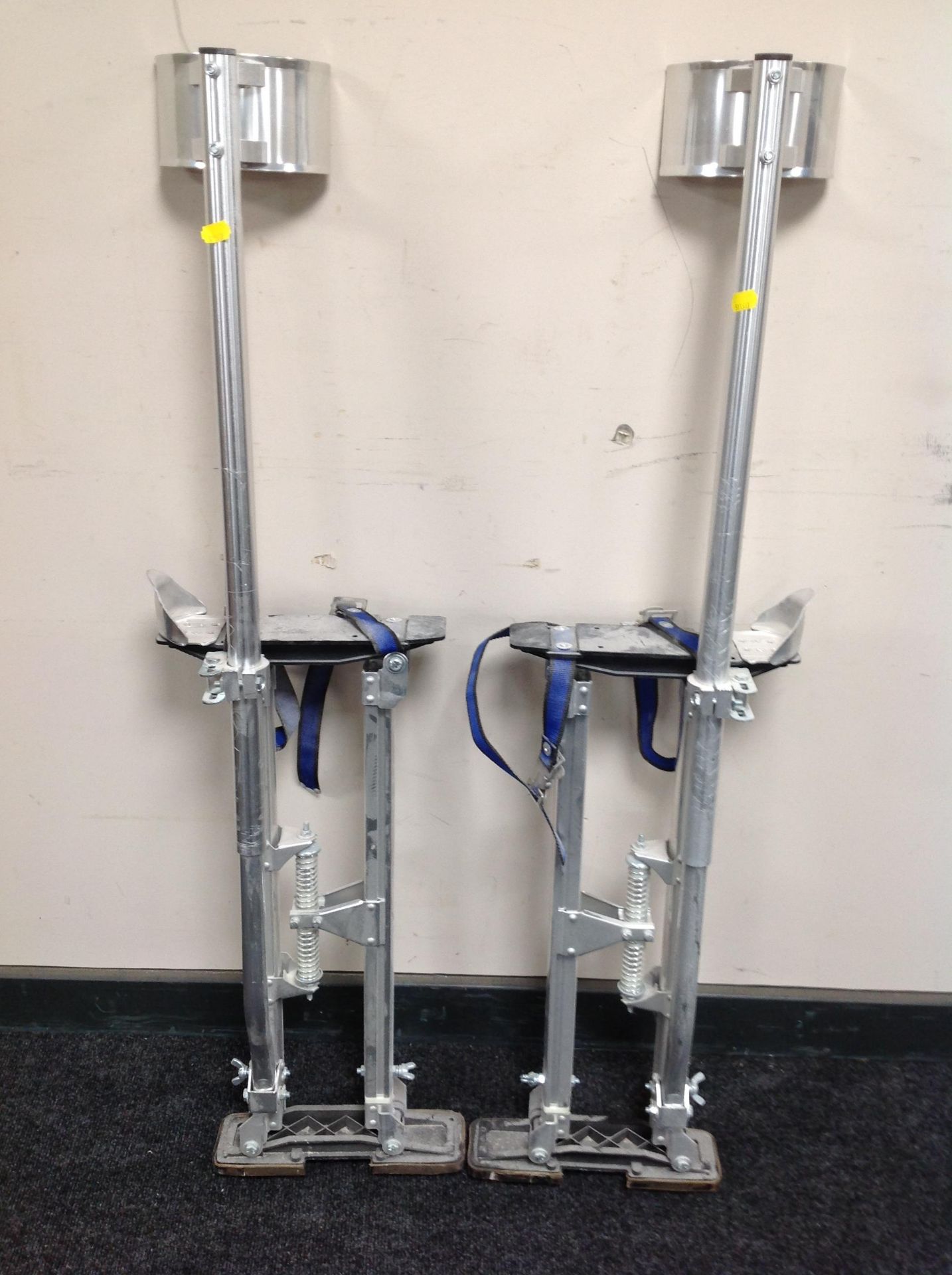 A pair of dry wall stilts