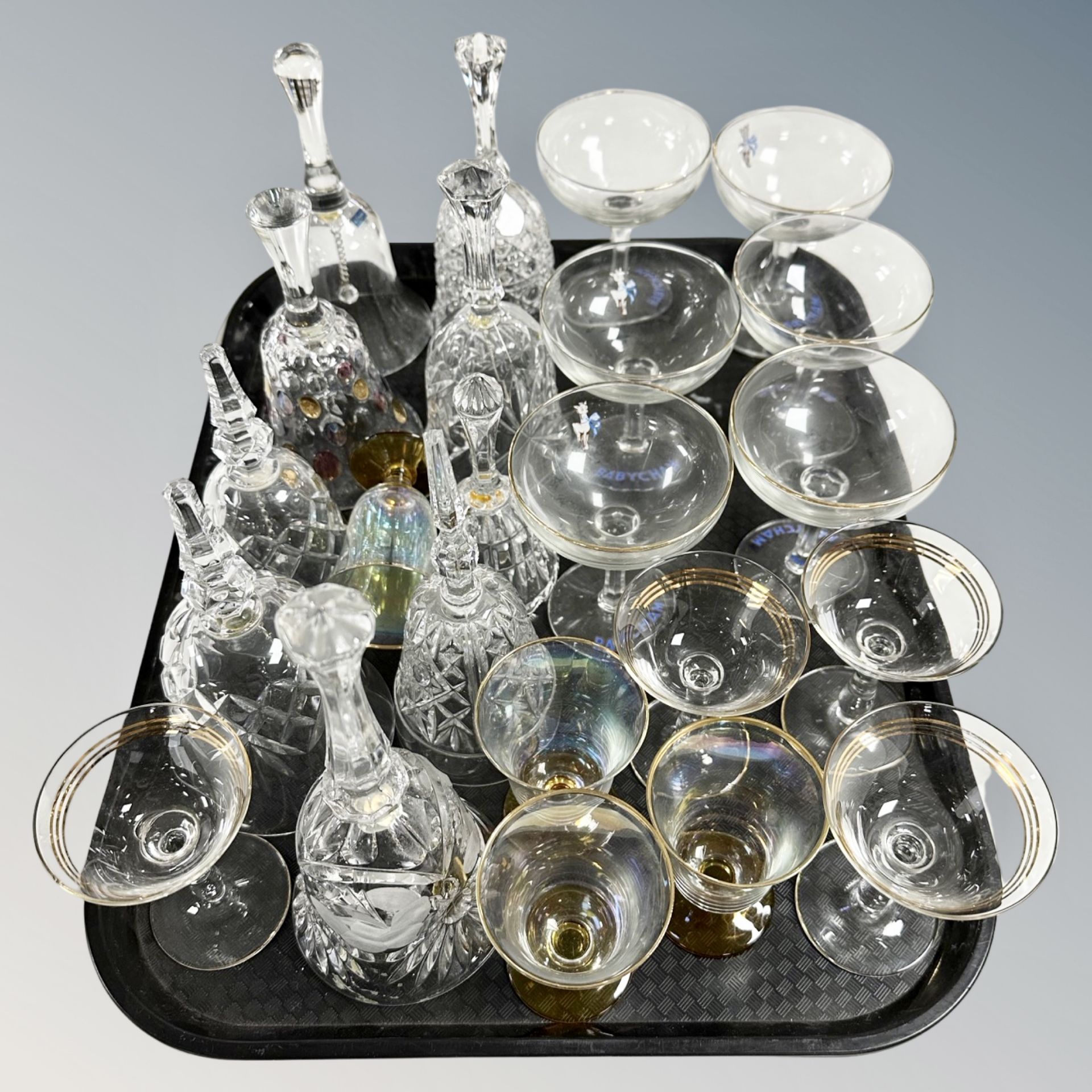 A tray of vintage and later glass ware, Babycham glasses,