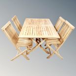 A good quality teak folding garden table with four chairs, table dimensions 85 cm x 135 cm,