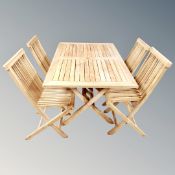 A good quality teak folding garden table with four chairs, table dimensions 85 cm x 135 cm,