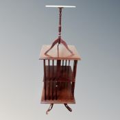 A Victorian style revolving book stand together with marble topped wine table