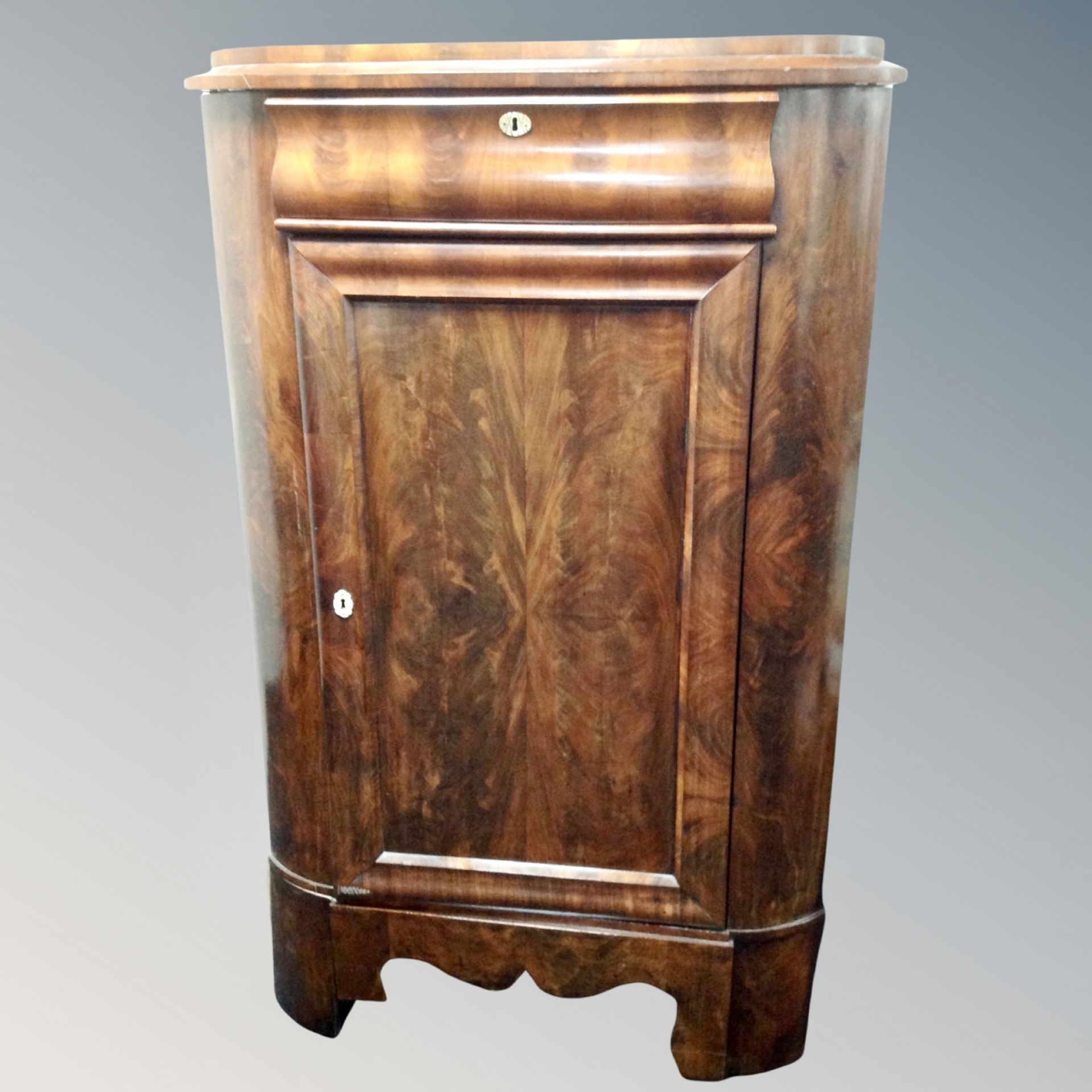 A 19th century mahogany corner cabinet fitted a drawer (feet a/f) CONDITION REPORT: