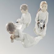 Three Nao figures : children in night dress