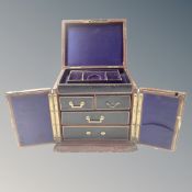 A 19th century leather bound fitted jewellery casket