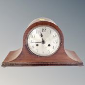 A 20th century mahogany cased mantel clock with silvered dial