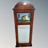 An antique mahogany framed mirror 39 cm x 20 cm