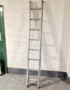 A twin section aluminium ladder