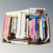 A box of hardbacked books, The Beatles, antique guides,