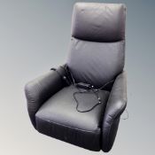 A continental electric armchair in black leather