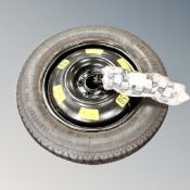 A Citroen C4 space saver spare wheel with tool kit