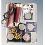 A pocket telescope in leather case together with assorted commemorative coins and crowns