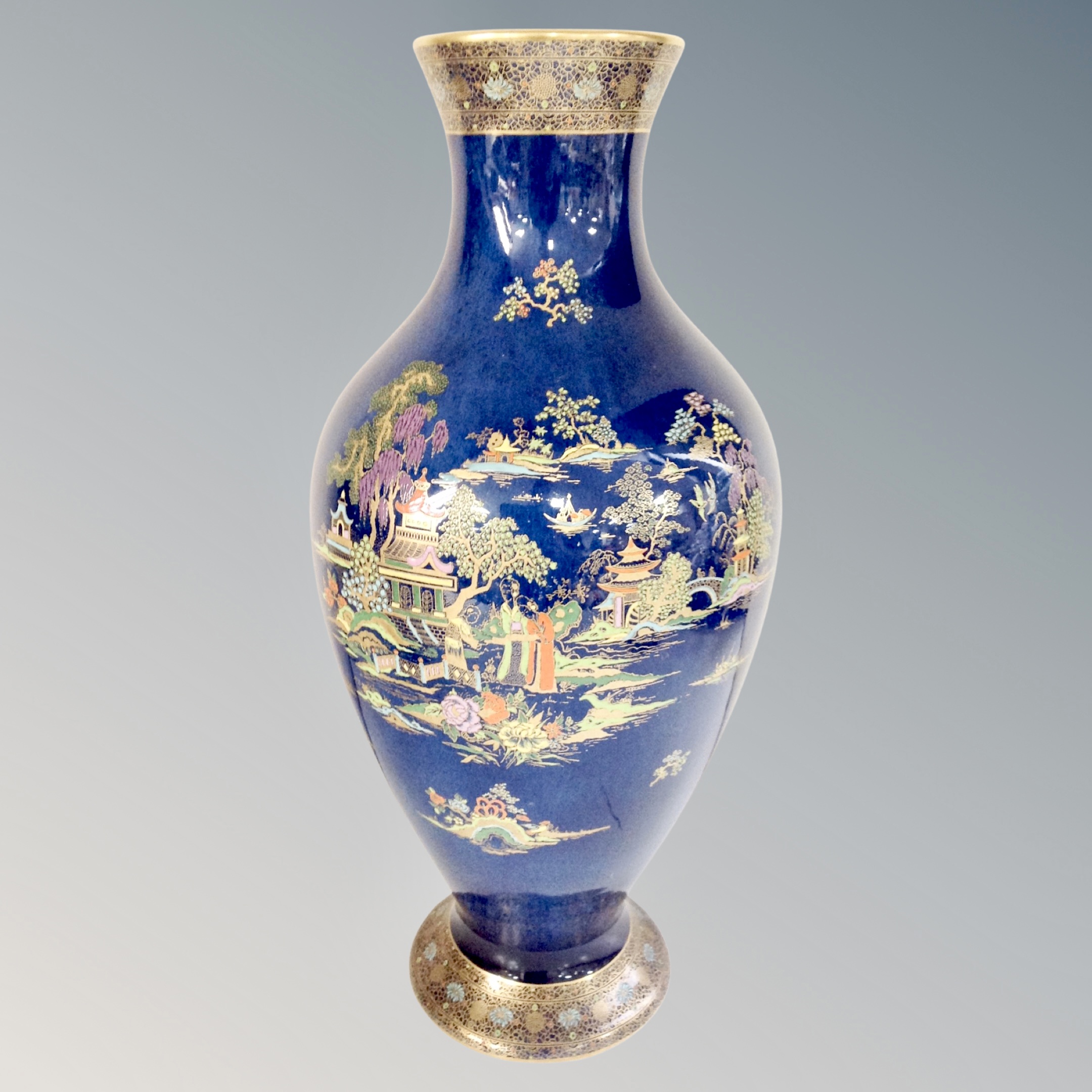 A Crown Devon gilded vase in an oriental style, height 46.