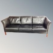 A 20th century Danish black leather three seater settee