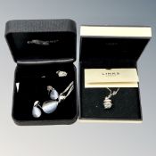 A Diamonfire silver pendant and matching earrings in box,