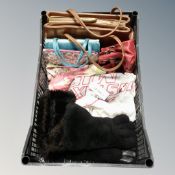 A crate of lady's faux fur hat and gloves, assorted hand bags,