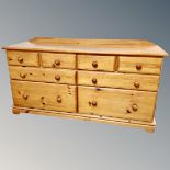 A pine eight drawer block chest
