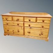 A pine eight drawer block chest