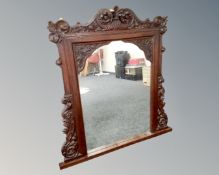 A Victorian overmantel mirror, width 105cm, height 109cm.