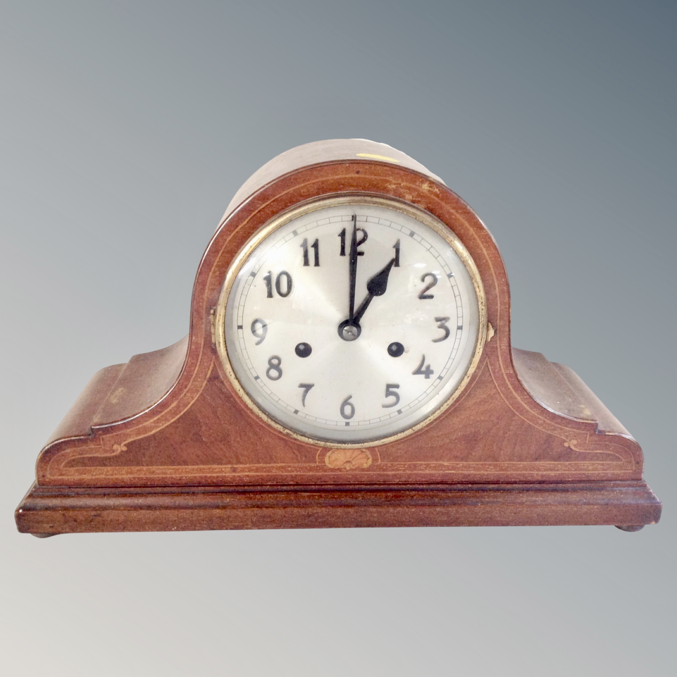 A 20th century mahogany cased mantel clock with silvered dial