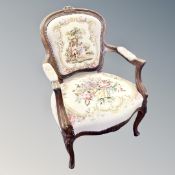 A carved beech framed salon chair in tapestry fabric
