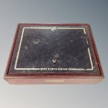 A Remy Martin cognac table topped cigarette box