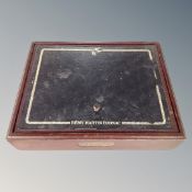 A Remy Martin cognac table topped cigarette box