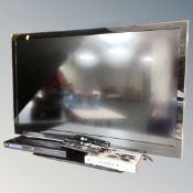 An LG 3D TV model 42LW4500-ZB with glasses and remote,