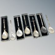 A collection of seven silver apostle spoons each showing a different saint (five boxed)