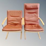 A pair of Danish Mogens Hansen armchairs with tan leather cushions