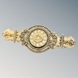 An antique 15ct gold pearl and diamond bar brooch CONDITION REPORT: 4.