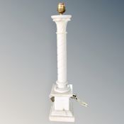 A white marble column table lamp,