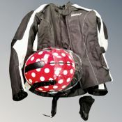 A Switx polkadot motorcycle helmet in carry bag and a Weise motorcycle jacket