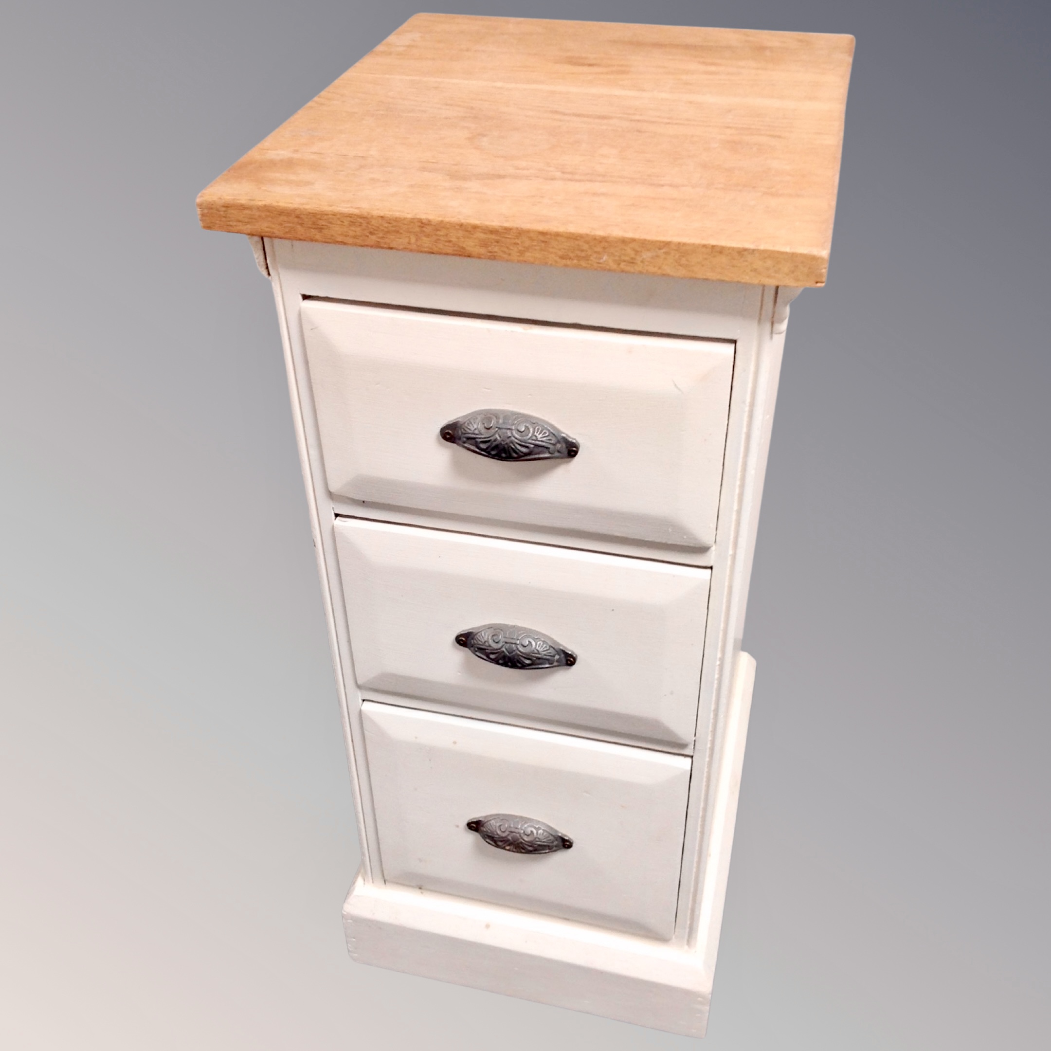 A narrow oak shabby chic three drawer narrow chest