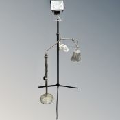 A contemporary industrial style angelfish floor lamp together with a site light on tripod stand