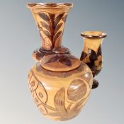 A carved wooden vase, height 27 cm,
