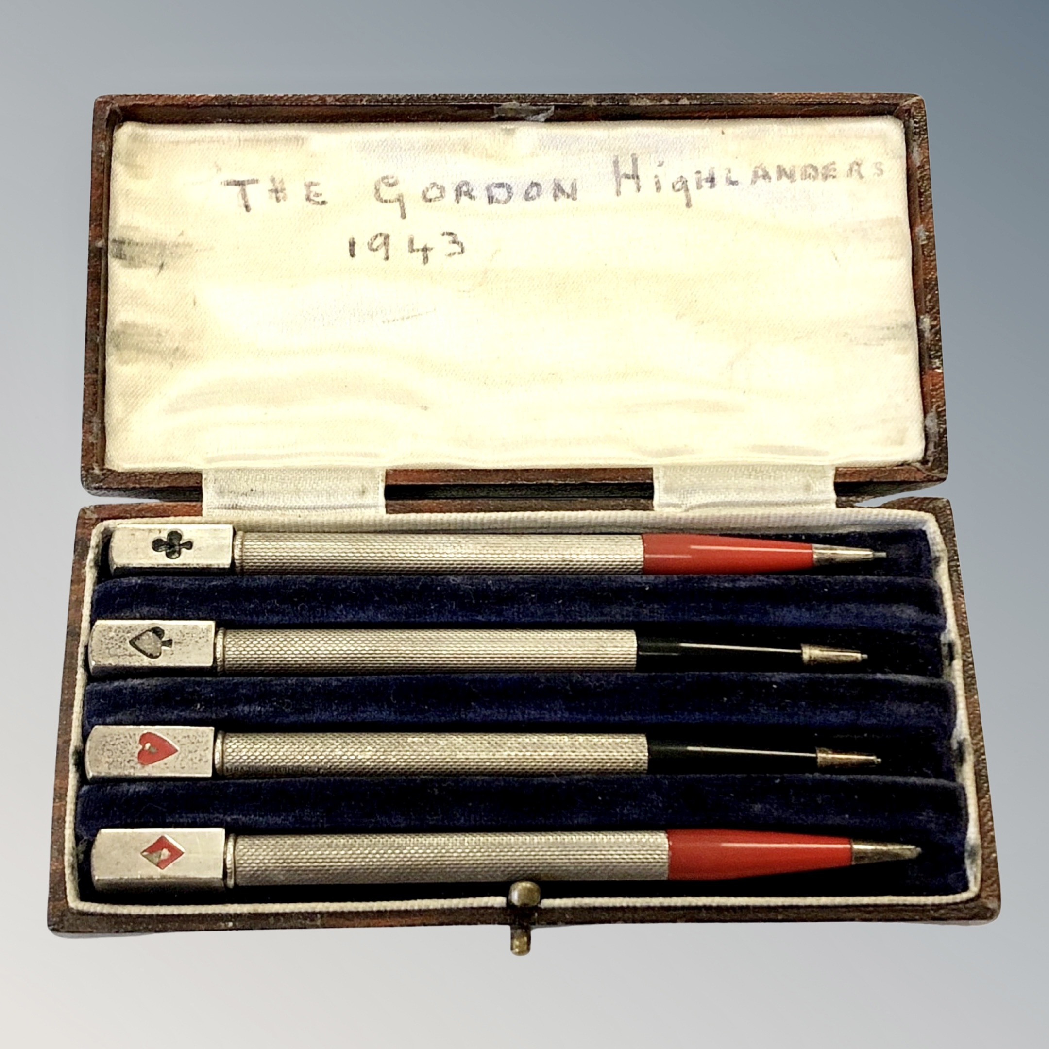 A set of four bridge pencils marked Gordon Highlanders,