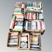 A pallet of nine boxes of books including novels,