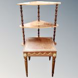 An Italian style three tier corner what not stand and a leather topped occasional table