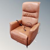 A continental electric armchair in brown leather