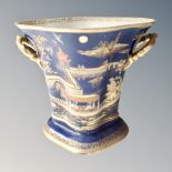 A Carlton Ware gilded twin handled vase in an oriental style,