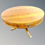 An inlaid Yewwood circular coffee table
