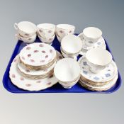 A tray of nineteen pieces of Crown Regent bone tea china,