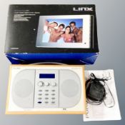 A Pure Evok 2 DAB radio with instructions and lead together with Linx digital photograph frame