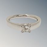 An 18ct white gold princess cut solitaire diamond ring, approximately 0.